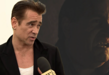 Colin Farrell Dishes on The Barman: Part II A man in a dark jacket speaking into a reporter's microphone during a TV interview